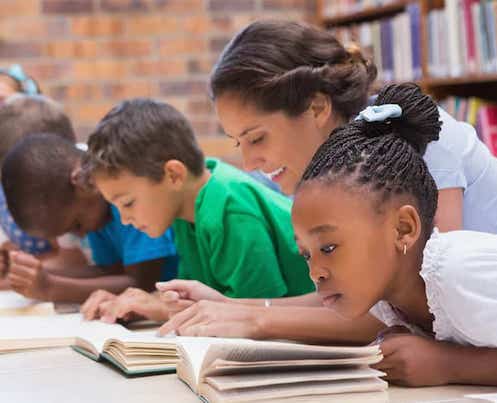 teacher and students reading